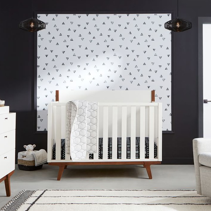 Standard crib in black and white nursery
