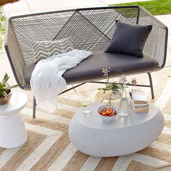 Pebble coffee table and outdoor chair.
