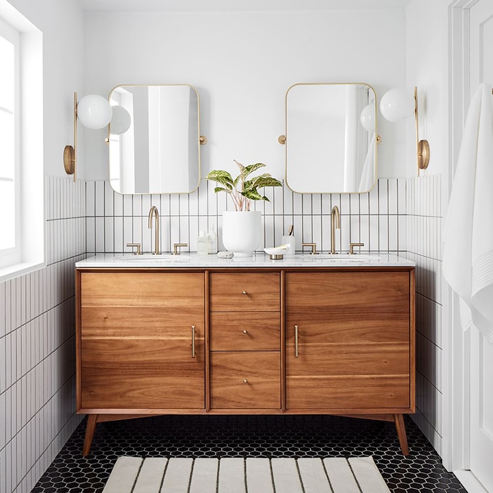 bathroom vanity with two sinks and mirrors