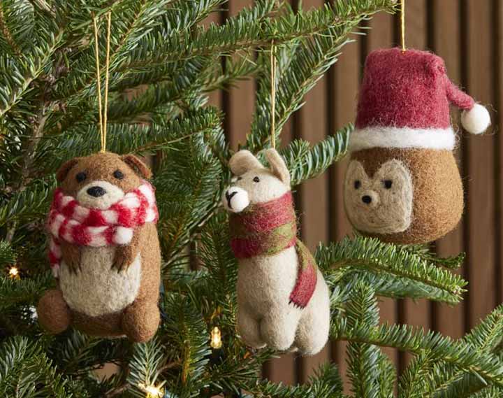 felt animal ornaments hanging on tree