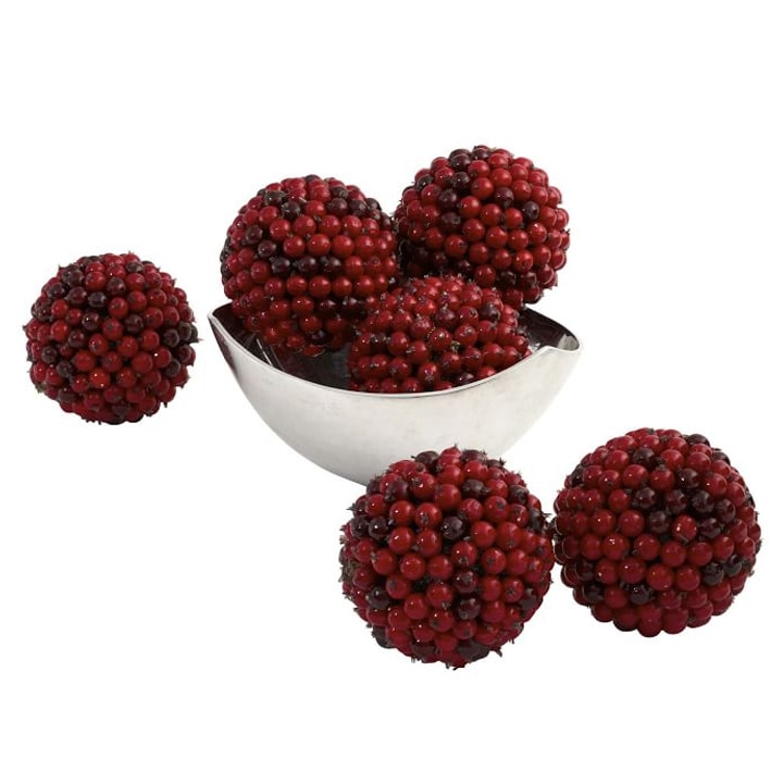 faux berry balls in silver bowl