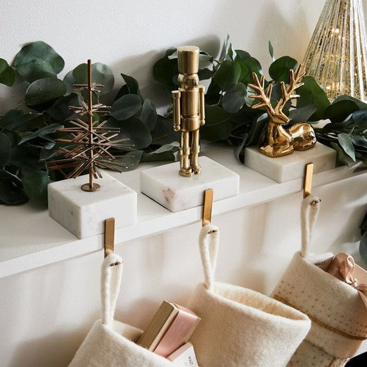 marble and gold christmas stocking holders