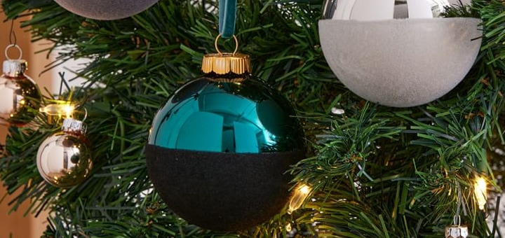 close up of christmas ornaments on christmas tree