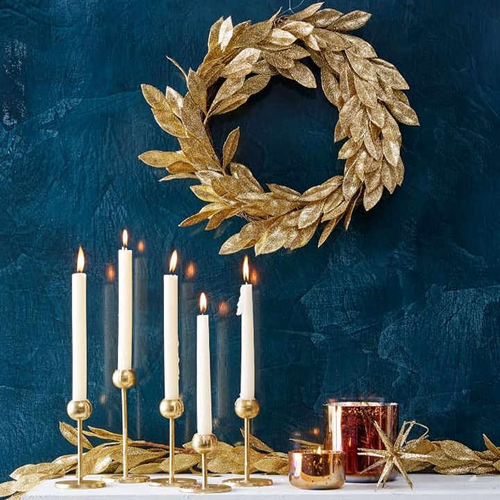 gold candle sticks and mantle christmas decor