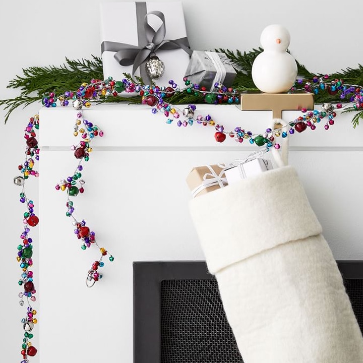 multicolor jingle bell garland on mantle