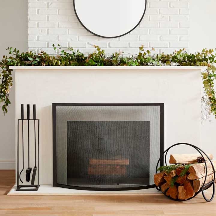 modern white fireplace with mantle decor