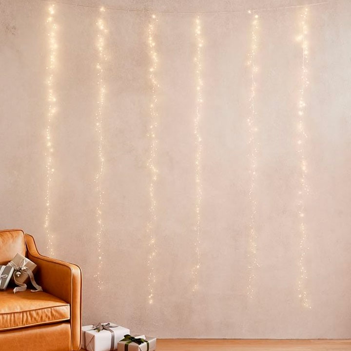 strands of twinkle lights hanging on wall