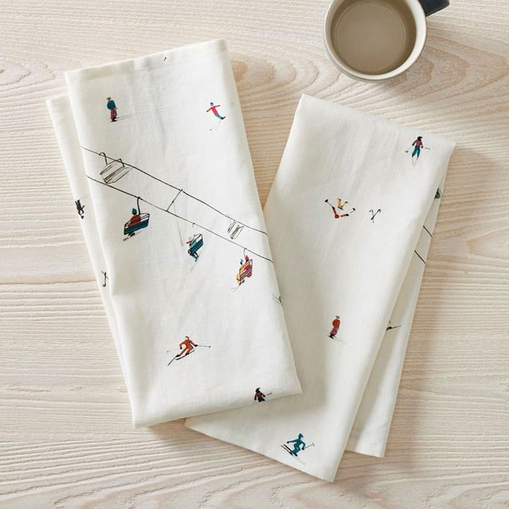 white decorative cloth napkins on wood background