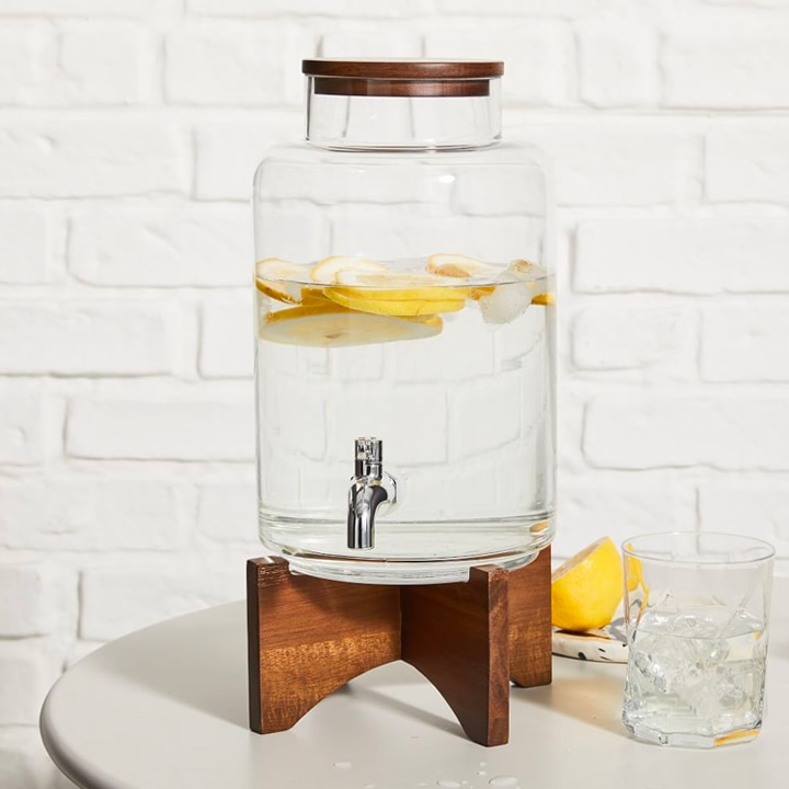 Lemon water in modern drink dispenser.