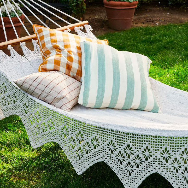 Hammock with assorted pillows.