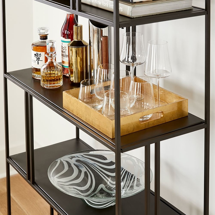 metal shelf with wine glasses