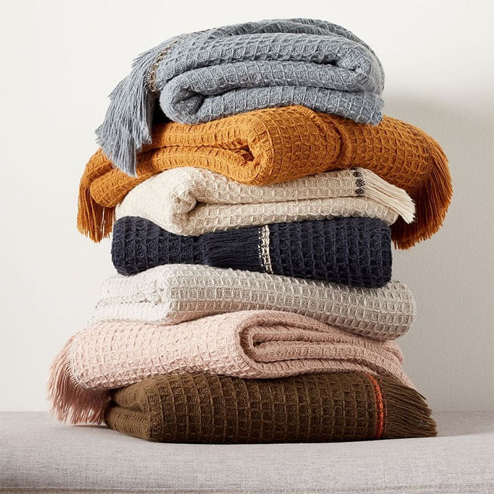 cotton waffle blankets in pile