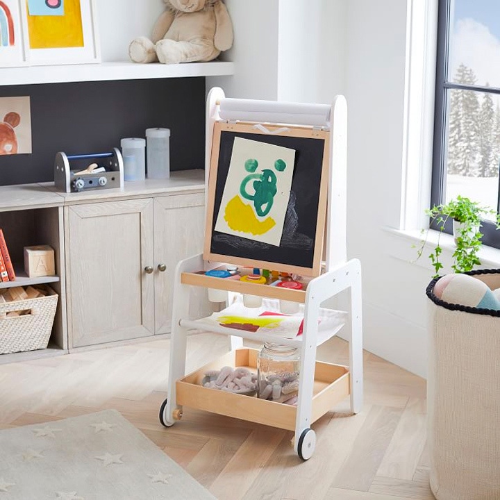 children’s easel with art supplies