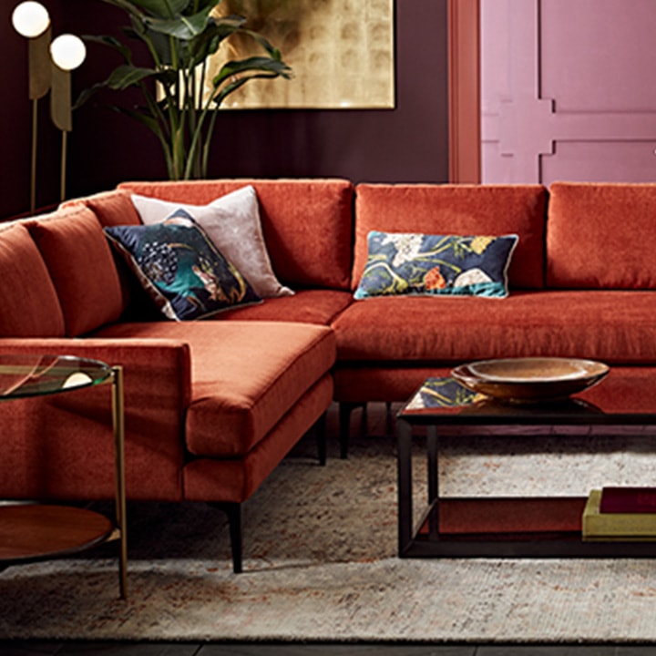 Red sofa with red decorative pieces and shades of red paint. Red sofa with red decorative pieces and shades of red paint.