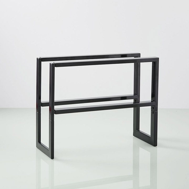 Black adjustable shoe rack.