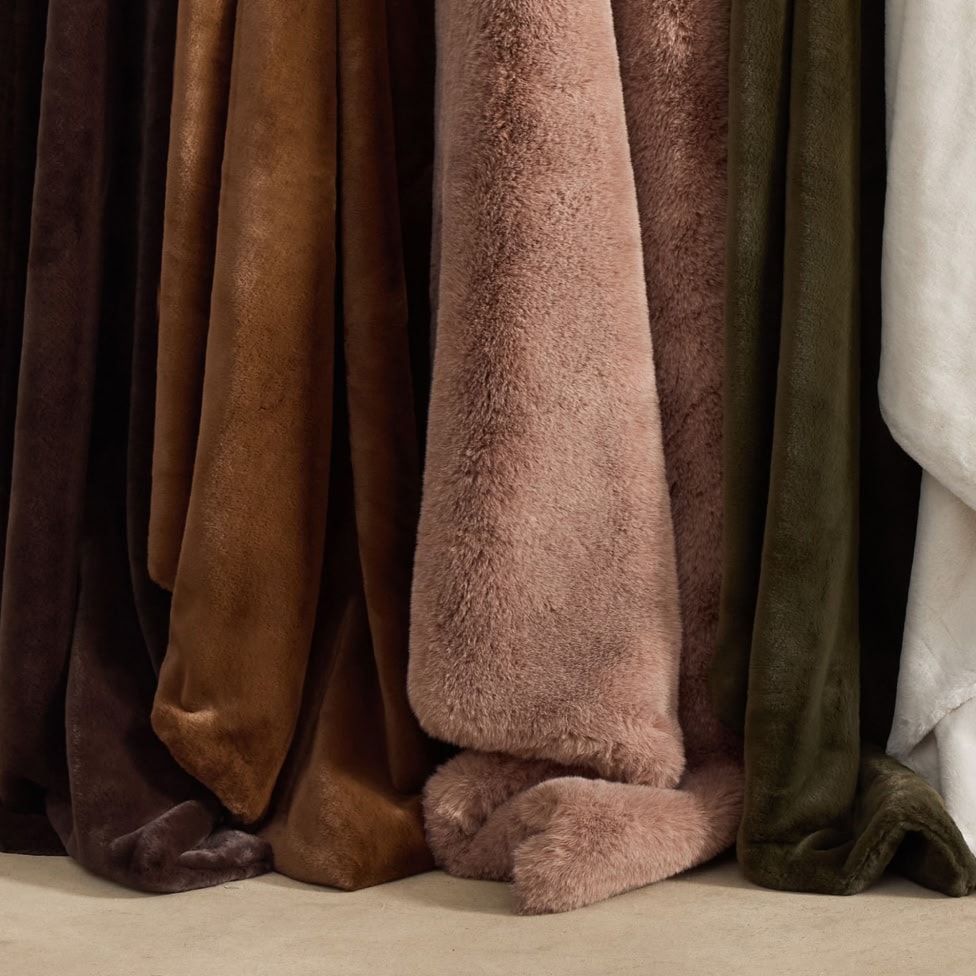 UP TO 40% OFF THROWS