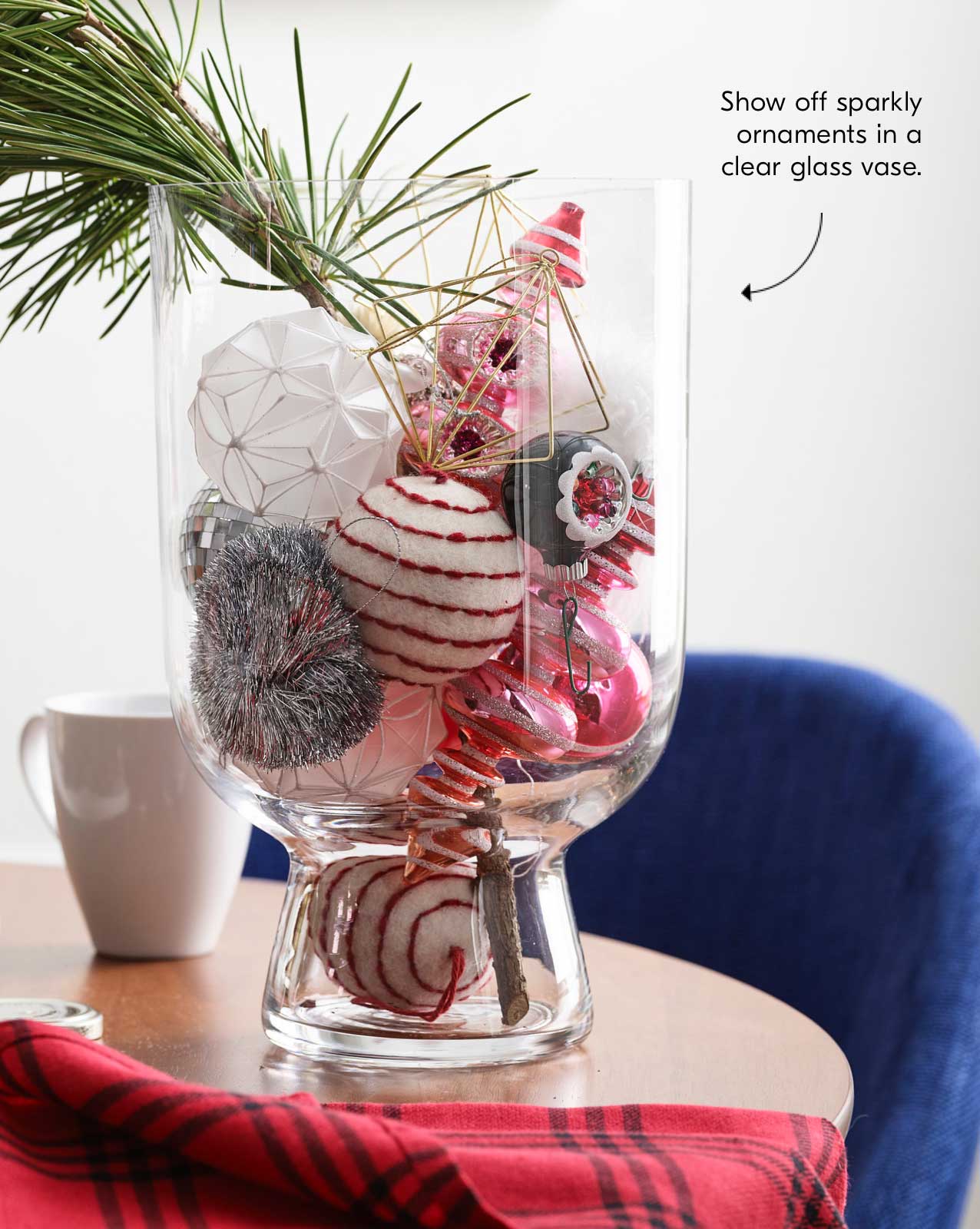 Show off sparkly ornaments in a clear glass vase.