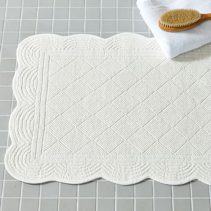 https://assets.weimgs.com/weimgs/rk/images/wcm//products/202342/0078/heather-taylor-home-organic-scallop-edge-bath-mat-o.jpg