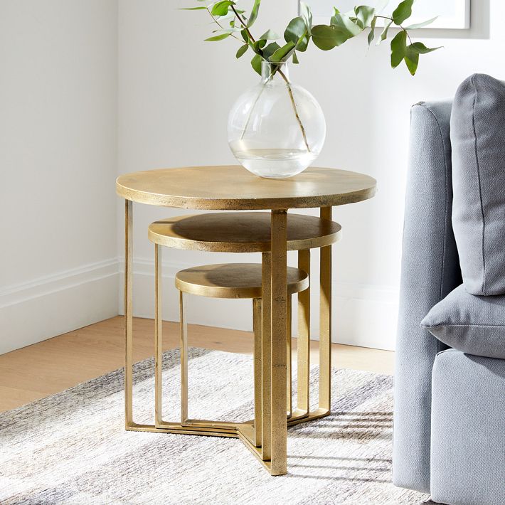 Brass nesting store side tables