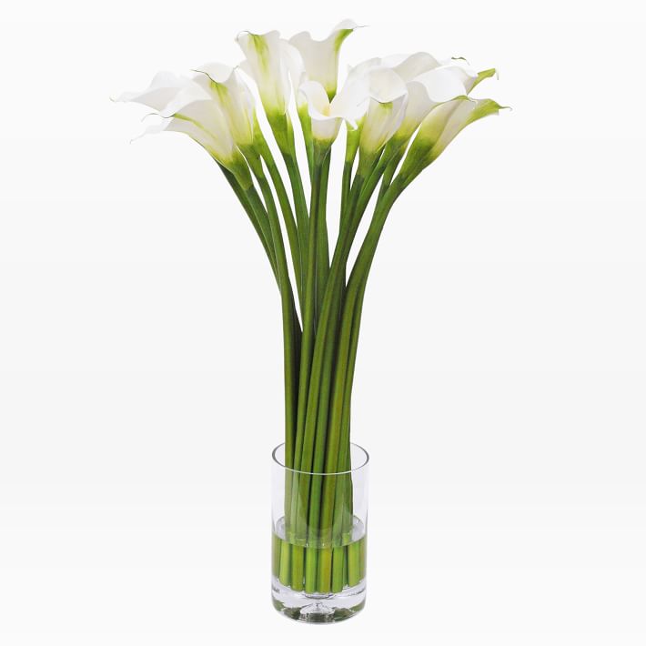fake lilies in vase