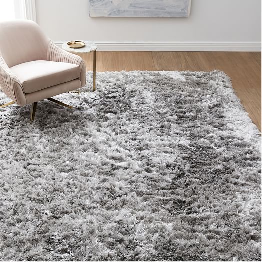 grey and blue fuzzy rug