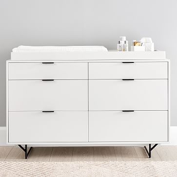 white dresser and changing table