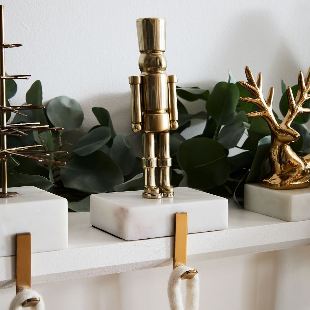 Brass & Marble Nutcracker Stocking Holder West Elm