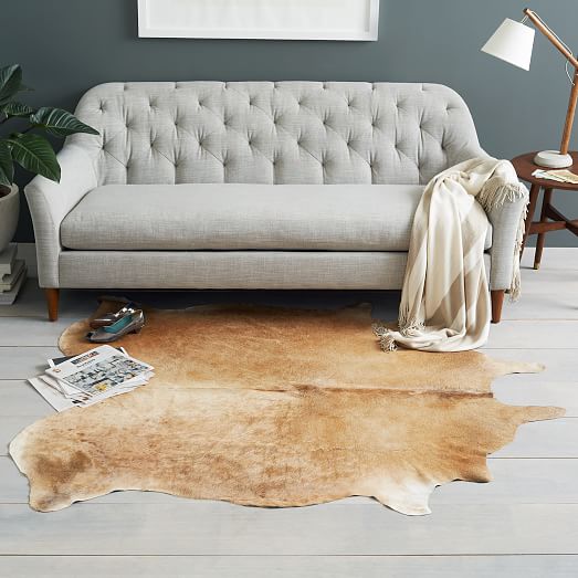 Cowhide Rug, How To Place A Cowhide Rug In Living Room