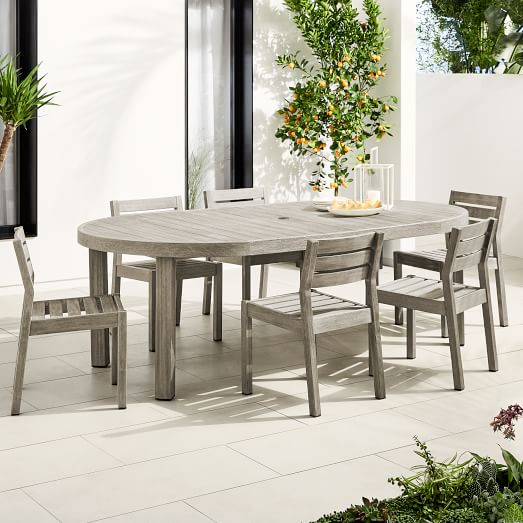 expandable round dining table with chairs