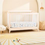 light wooden crib