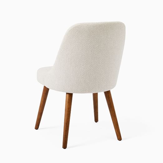 grey chair with wood legs