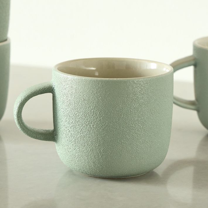 green ceramic mugs