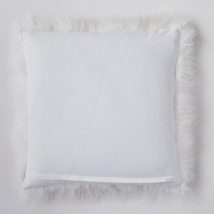 https://assets.weimgs.com/weimgs/rk/images/wcm/products/202328/0033/mongolian-lamb-pillow-cover-o.jpg