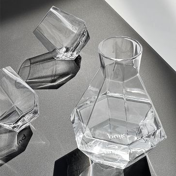 https://assets.weimgs.com/weimgs/rk/images/wcm/products/202331/0025/puik-designs-faceted-glass-carafe-m.jpg