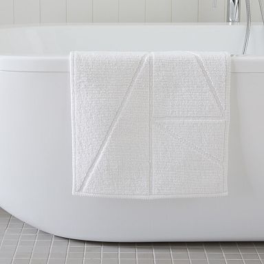 https://assets.weimgs.com/weimgs/rk/images/wcm/products/202332/0015/triangle-sculpted-bath-mat-q.jpg
