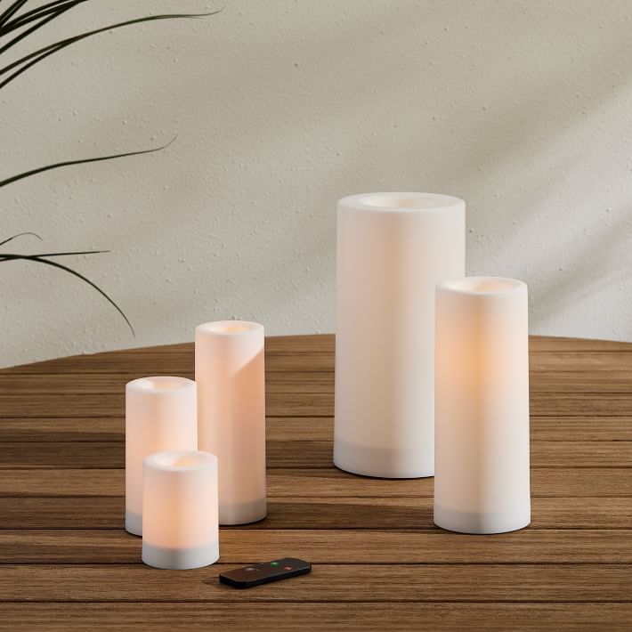https://assets.weimgs.com/weimgs/rk/images/wcm/products/202332/0017/indoor-outdoor-flat-top-basic-candle-white-1-o.jpg