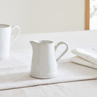 https://assets.weimgs.com/weimgs/rk/images/wcm/products/202332/0118/costa-nova-beja-stoneware-creamer-holder-q.jpg