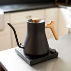 https://assets.weimgs.com/weimgs/rk/images/wcm/products/202334/0057/fellow-stagg-ekg-electric-kettle-matte-black-w-maple-handl-f.jpg