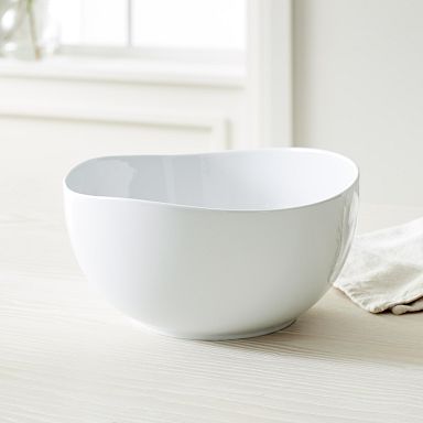 https://assets.weimgs.com/weimgs/rk/images/wcm/products/202337/0001/organic-shaped-porcelain-10-tall-serving-bowl-q.jpg