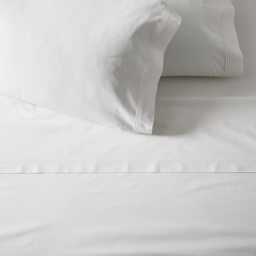 https://assets.weimgs.com/weimgs/rk/images/wcm/products/202338/0026/400-thread-count-organic-percale-pleated-edge-sheet-set-pi-c.jpg