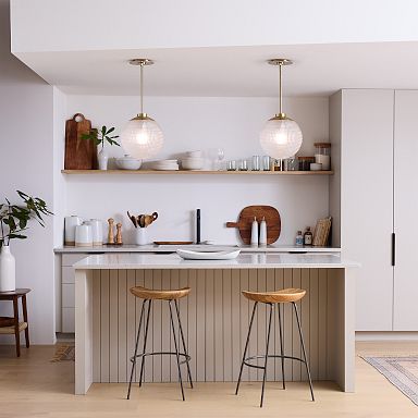 Blue Kitchen Island with Built In Paper Towel Holder Next to Shaw