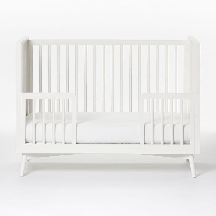 White mid store century crib