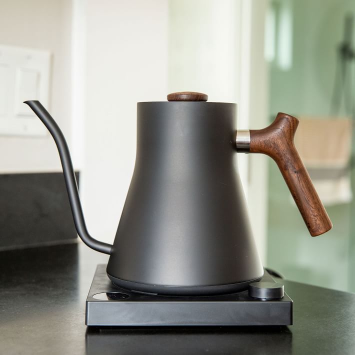 https://assets.weimgs.com/weimgs/rk/images/wcm/products/202342/0124/fellow-stagg-electric-kettle-matte-black-w-walnut-handle-o.jpg