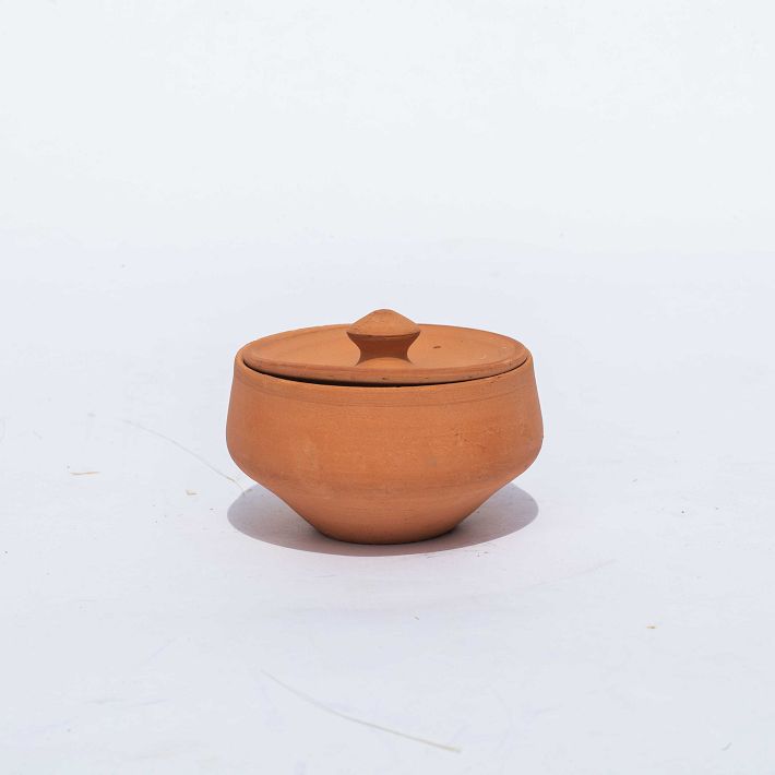 Small clay pot with a lid