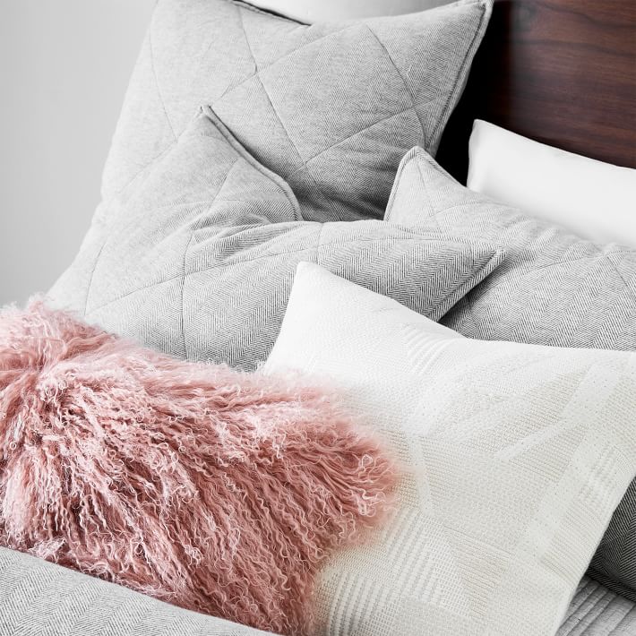 West elm outlet mongolian lamb cushion