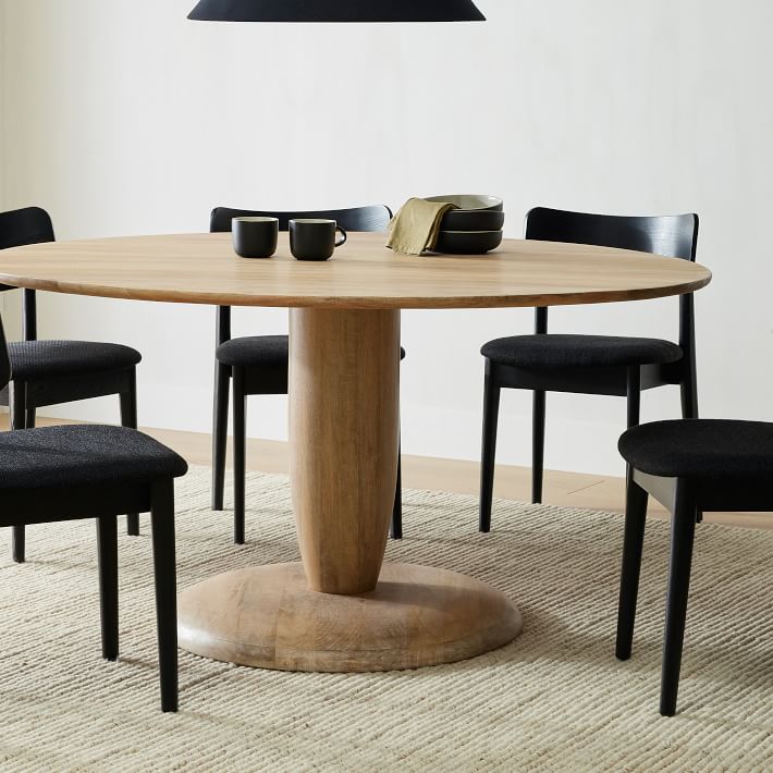 CONTEMPORARY LIVING Round wooden table By VOLPI