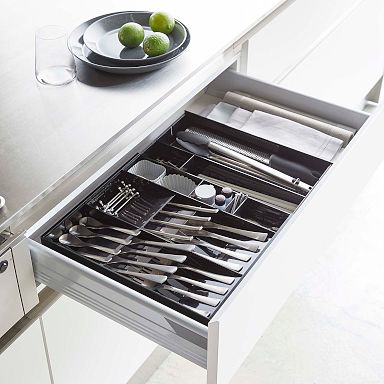https://assets.weimgs.com/weimgs/rk/images/wcm/products/202346/0085/yamazaki-tower-expandable-cutlery-drawer-organizer-1-q.jpg