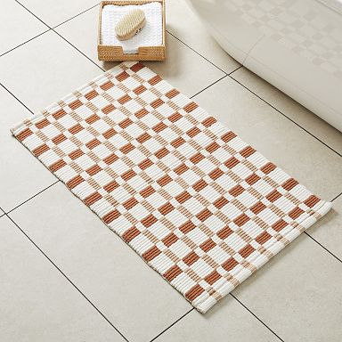 https://assets.weimgs.com/weimgs/rk/images/wcm/products/202349/0155/square-ribbed-bath-mat-4-q.jpg