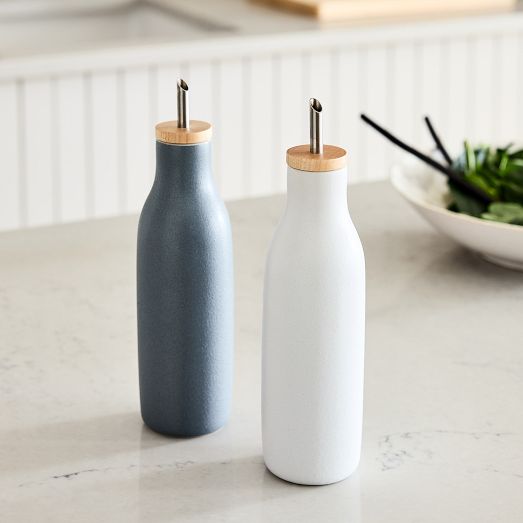 https://assets.weimgs.com/weimgs/rk/images/wcm/products/202351/0002/kaloh-stoneware-oil-vinegar-dispensers-set-of-2-c.jpg