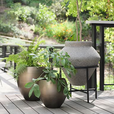 https://assets.weimgs.com/weimgs/rk/images/wcm/products/202351/0037/geometric-urn-planter-w-stand-q.jpg